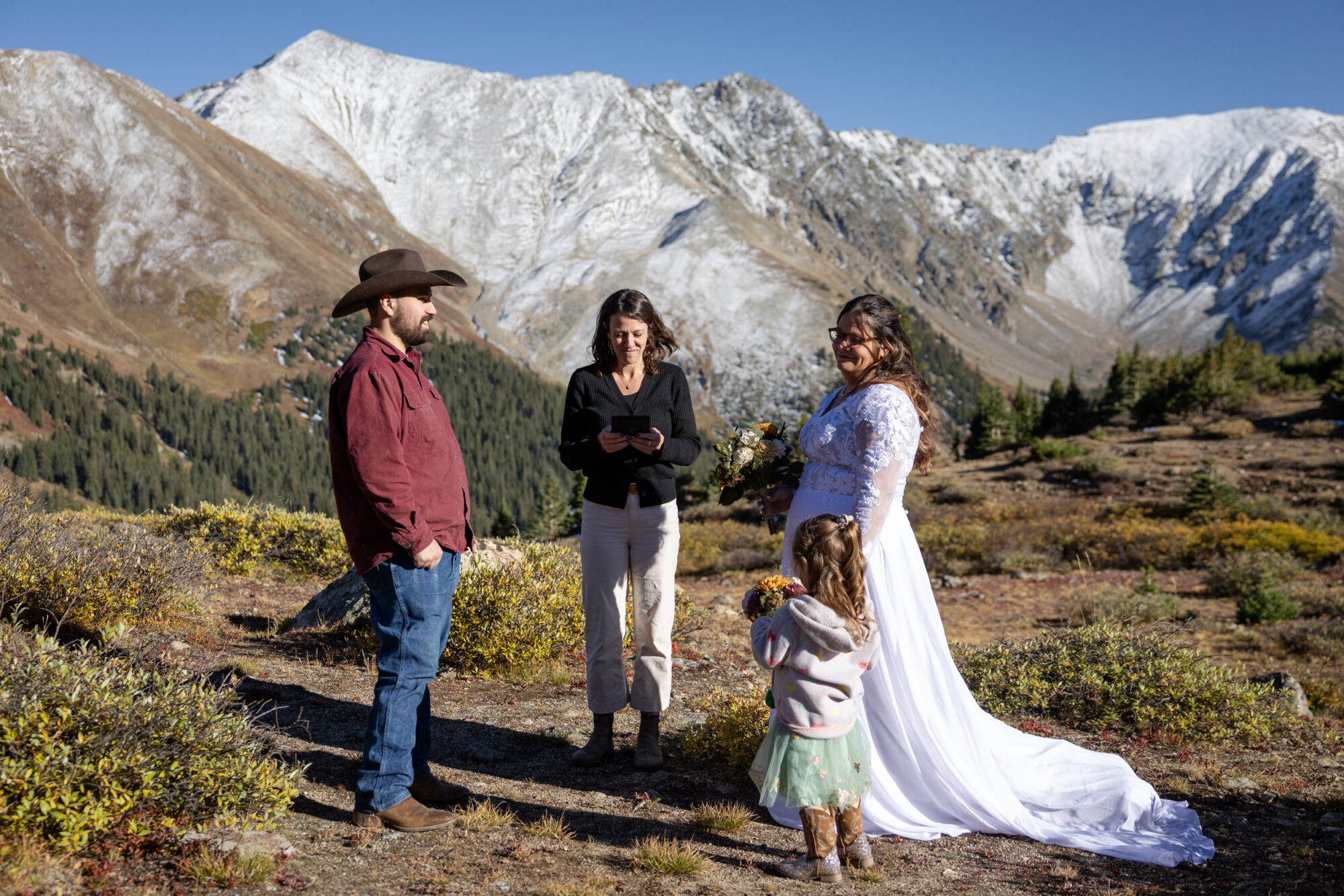 A Loveland Pass Elopement in Colorado: Horseback Riding and a Mountain Wedding | Scenic Vows Small mountain ceremony during a Loveland Pass elopement in Colorado with panoramic alpine views
