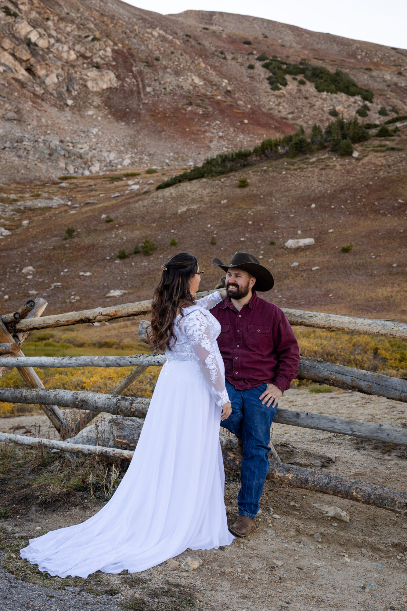 A Loveland Pass Elopement in Colorado: Horseback Riding and a Mountain Wedding | Scenic Vows Bride and groom sharing a quiet moment during their Loveland Pass elopement in the Colorado mountains